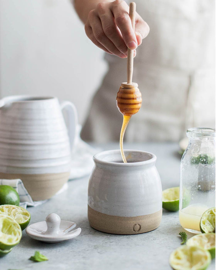 Beehive Honey Pot and Vermont Honey — honey lifted with the wooden dipper; Farmhouse Pottery