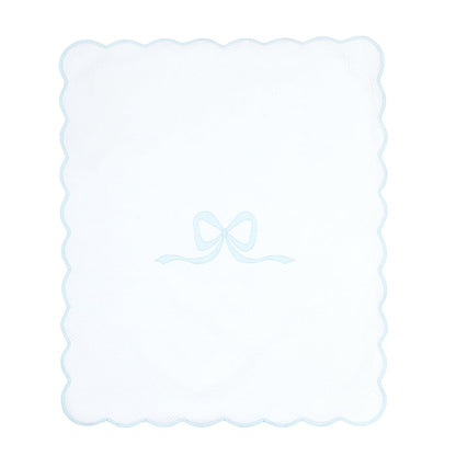 Lucy cotton blanket with blue bow and scalloped edge by Lenora