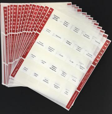 Stack of preprinted tabs for PROV with trade, state, and county labels on white sheets with red headers