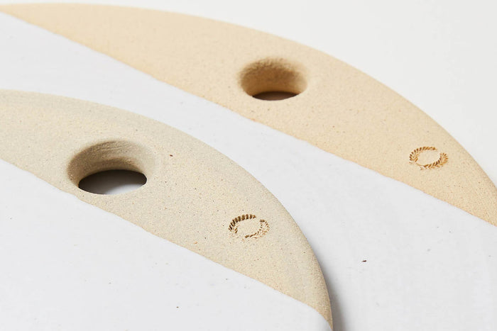 Round Stoneware Cheese Stone — close view of hanging holes and exposed clay edges; Farmhouse Pottery