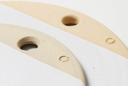 Round Stoneware Cheese Stone — close view of hanging holes and exposed clay edges; Farmhouse Pottery
