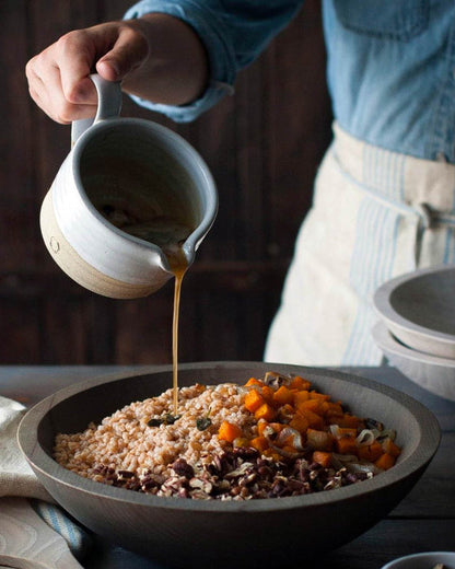 Silo Stoneware Sauce Boat — pouring sauce over a grain bowl; Farmhouse Pottery