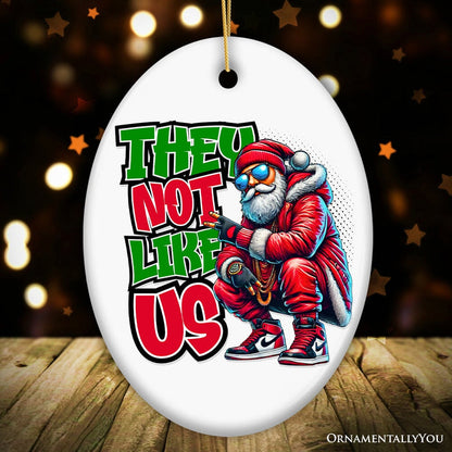 They Not Like Us Swag Santa Ornament, Funky Winter Guardian for Christmas Gift Ceramic Ornament OrnamentallyYou Oval