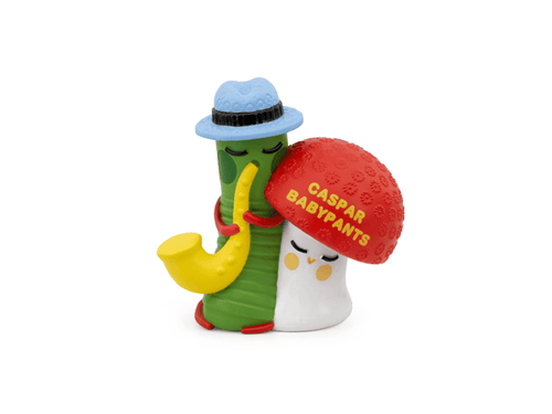 Two colorful figurines, one green with a blue hat and yellow pipe, the other white with a red hat and text, on a white background.