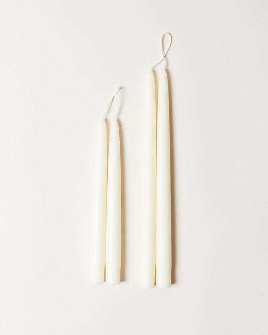 White Taper Candles — white taper candle lengths shown together; Farmhouse Pottery